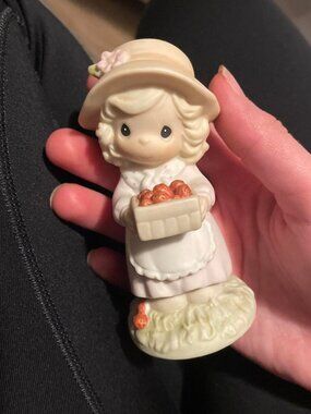 Figurine with Basket of Flowers